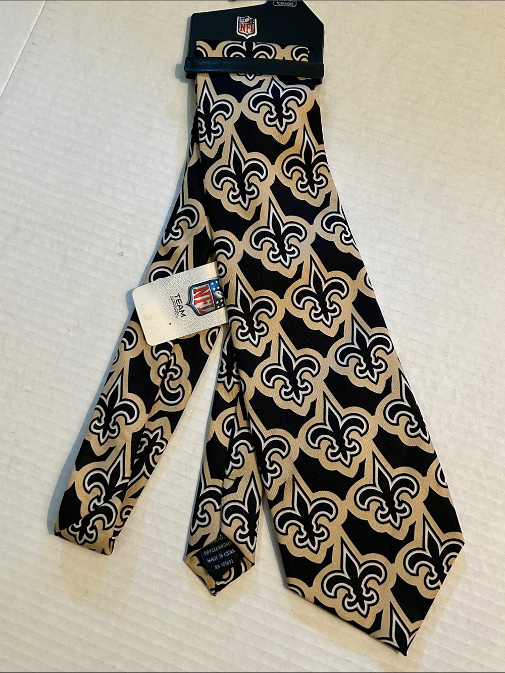 NFL New Orleans Saints Black and Gold Repeating Fleur-de-Lis Tie Football New